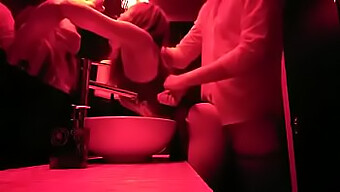 Gay Men Engage In Sexual Activity In The Bathroom Of A Nightclub