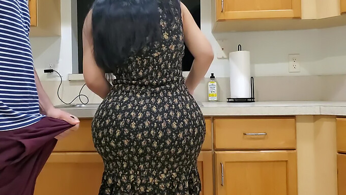 Brunette Stepmom Seduces Stepson In The Kitchen After Spotting His Hard Cock